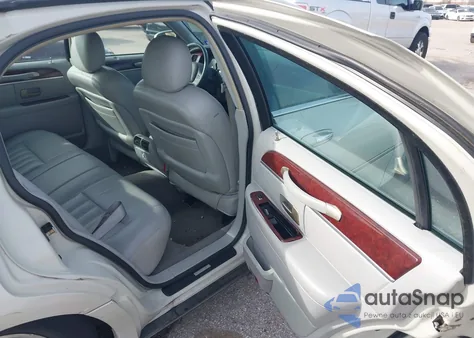 2004 Lincoln Town Car Signature z USA, uszkodzony, nr VIN 1LNHM81W34Y686997